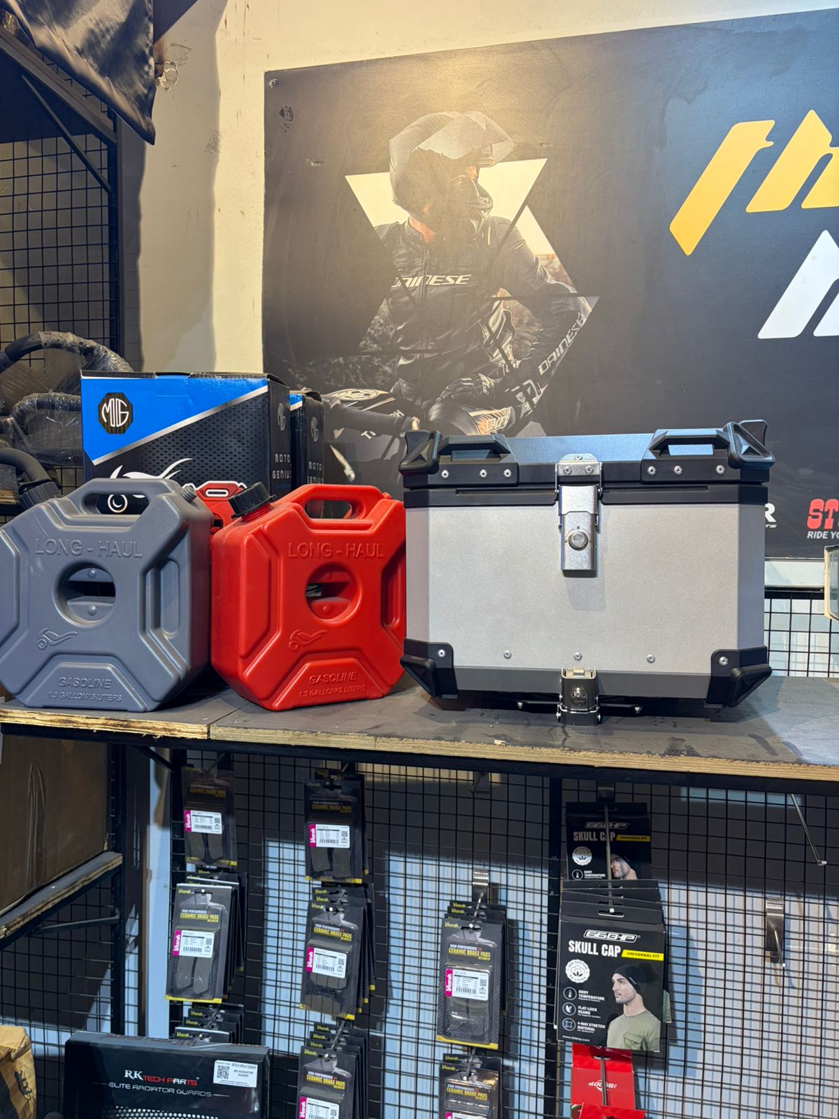 Throttle House accessories display with premium luggage and riding essentials