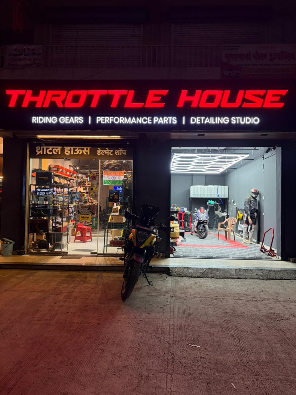 Throttle House helmet wall with colorful premium helmets